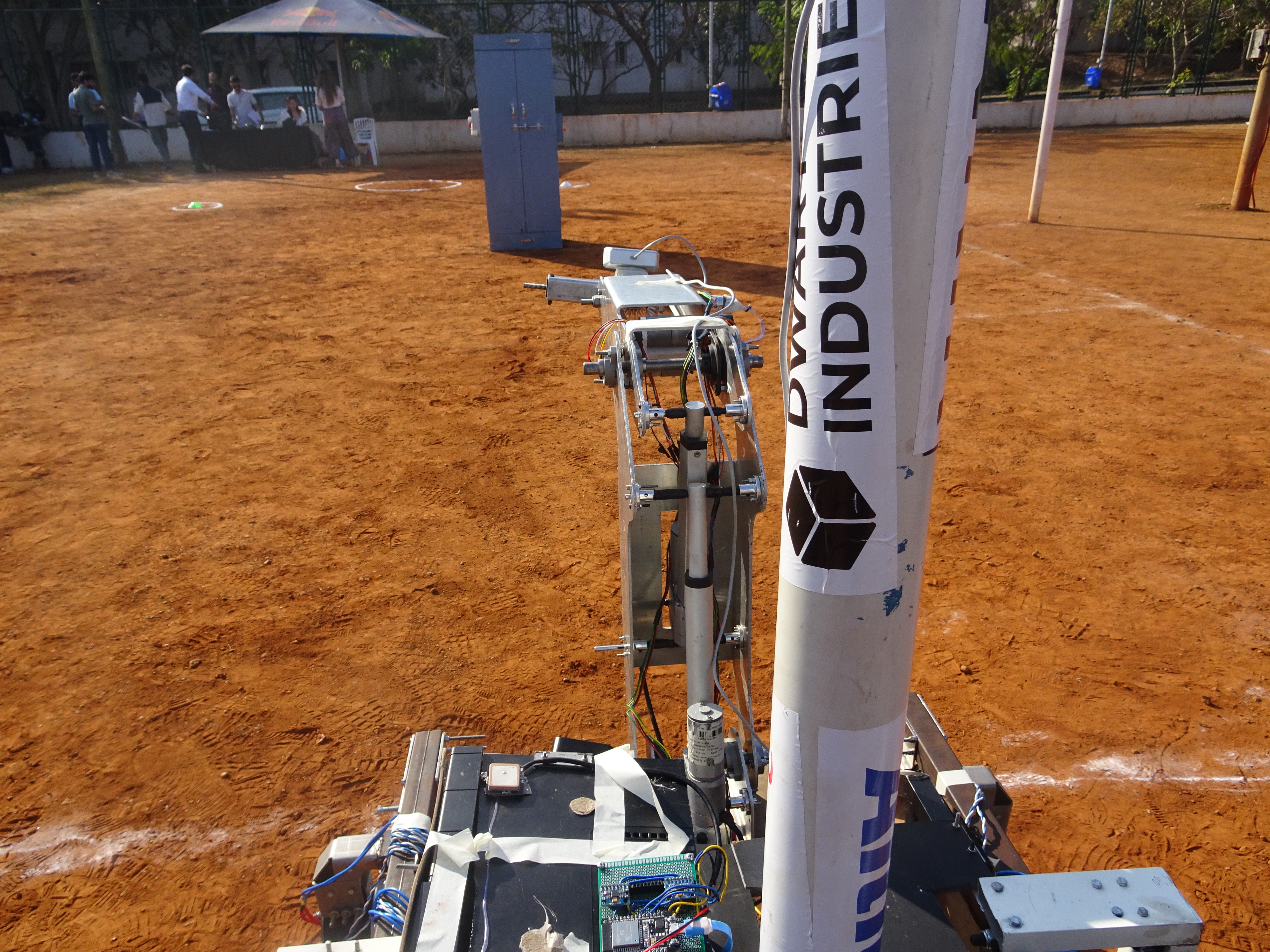 3D printing for robotics India — CRISS Robotics Mars rover at IRC 2025 competition field with Dwart Industries sponsor flag